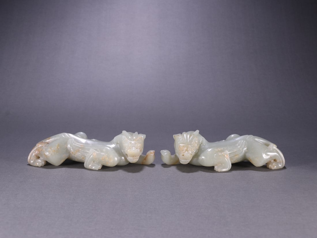 A Pair of Exquisite White Jade Auspicious Beast Ornament: A Pair of Exquisite White Jade Auspicious Beast Ornament Qing Dynasty, China Size:3.7cmx13.6cm Weight:512.5g (The Dimensions Of All Batches Are Manually Measured.If You Need More Detailed Information,
