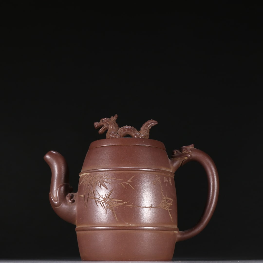 An Exquisite Purple Sands Bamboo Pattern Teapot: An Exquisite Purple Sands Bamboo Pattern Teapot Qing Dynasty, China Size:14cmx16.3cm (The Dimensions Of All Batches Are Manually Measured.If You Need More Detailed Information, Please Contact Our Cust