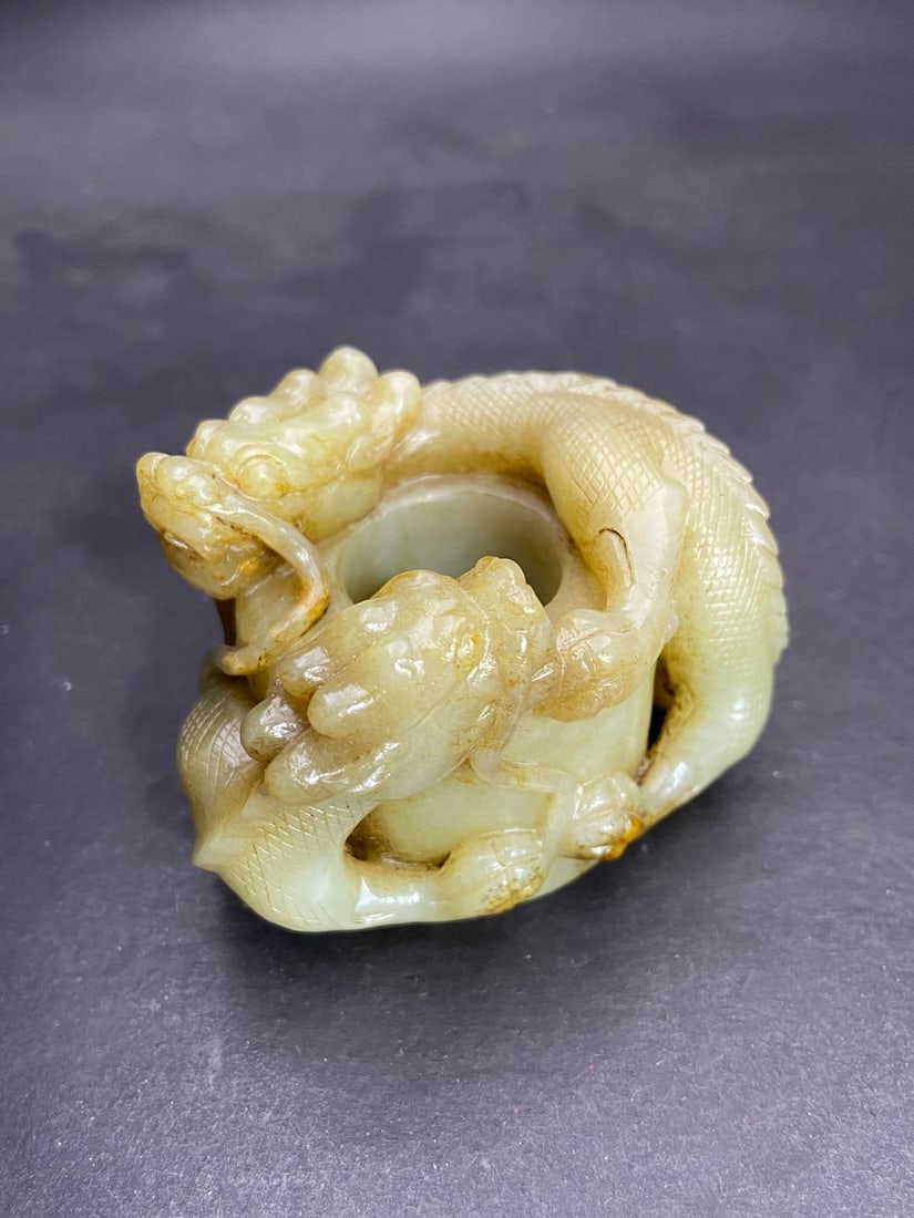 An Exquisite White Jade Dragon Pattern Ring: An Exquisite White Jade Dragon Pattern Ring Ming Dynasty, China Size:46.5cm Size:(inside diameter)22.2cm Weight:200g (The Dimensions Of All Batches Are Manually Measured.If You Need More Detailed Info