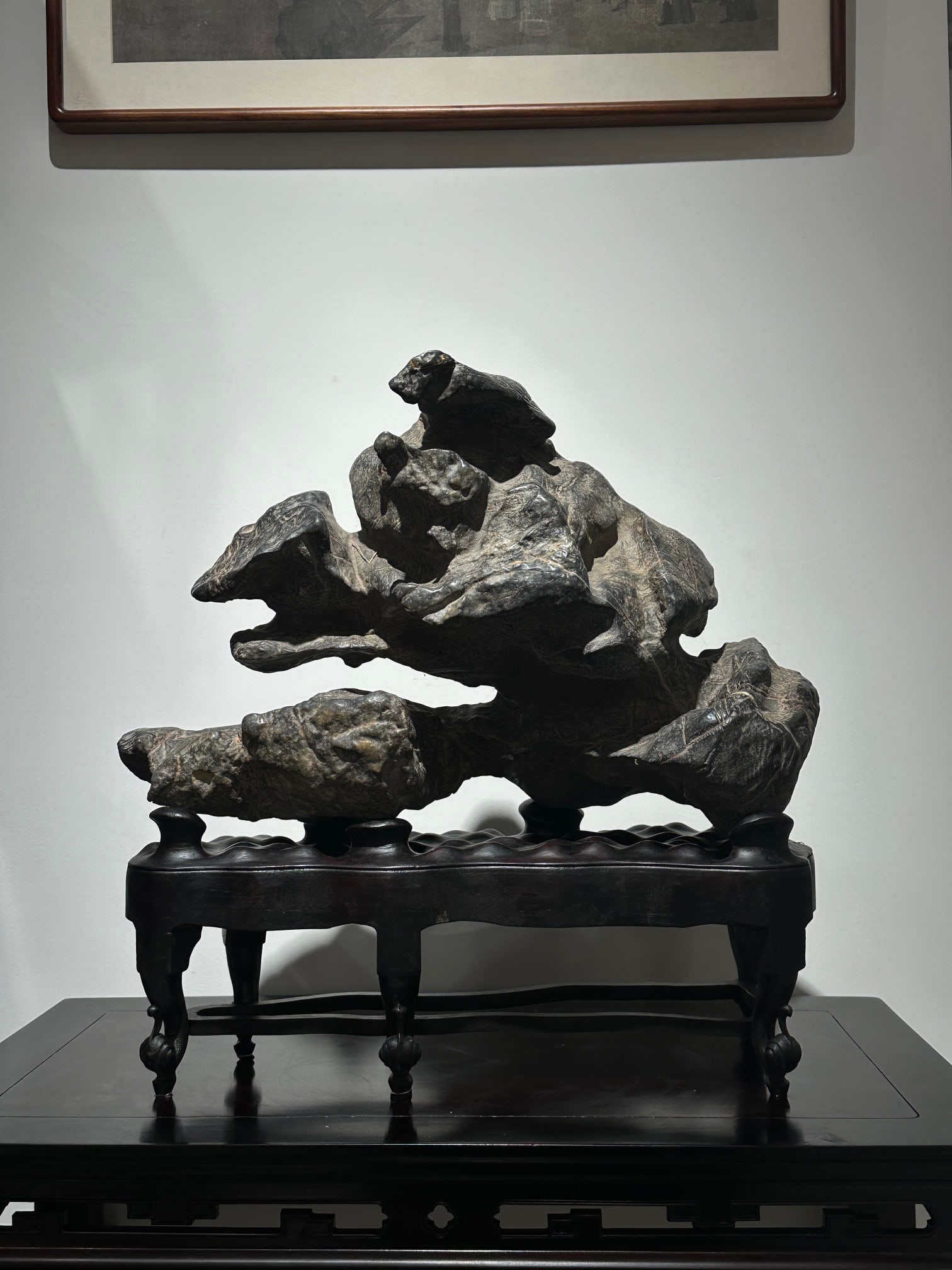 An Exquisite Lingbi Stone Ornament: An Exquisite Lingbi Stone Ornament Qing Dynasty, China Size:57cmx56cmx24cm (The Dimensions Of All Batches Are Manually Measured.If You Need More Detailed Information, Please Contact Our Customer