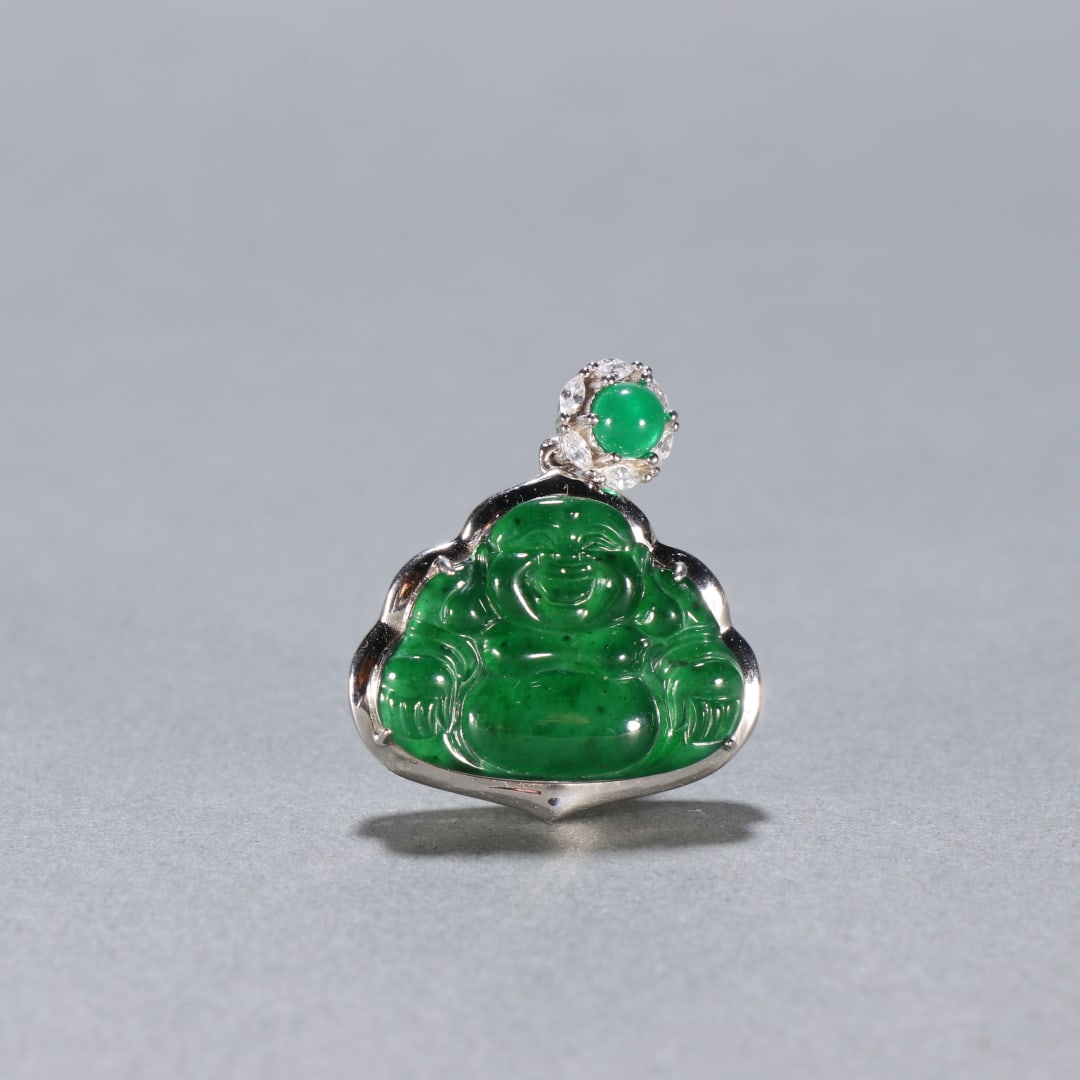 An Exquisite Jadeite Statue of Maitreya Buddha Pendant: An Exquisite Jadeite Statue of Maitreya Buddha Pendant Qing Dynasty, China Size:3.1cmx2.7cm Weight:6.5g (The Dimensions Of All Batches Are Manually Measured.If You Need More Detailed Information,