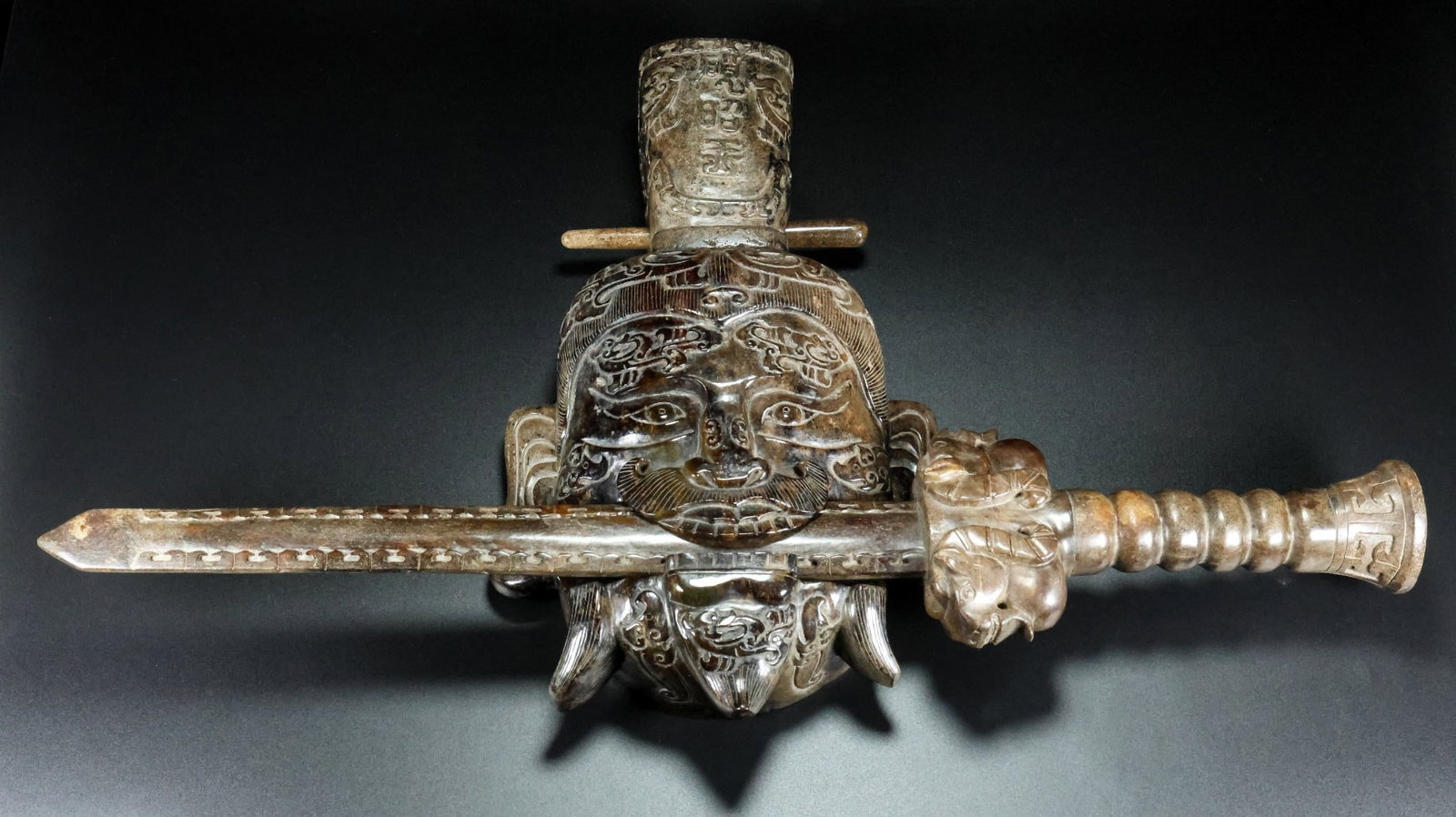 An Exquisite White Jade Sword Ornament: An Exquisite White Jade Sword Ornament Han Dynasty, China Size:37cmx20.5cmx7cm Weight:4600g Size:61.2cmx11.8cmx6.4cm Weight:1.466kg (The Dimensions Of All Batches Are Manually Measured.If You Need