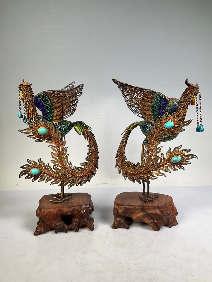 An Exquisite Gilt Silver Inlaid Gems Phoenix Ornament: An Exquisite Gilt Silver Inlaid Gems Phoenix Ornament Modern Time of China Size:25cm Weight:335g (The Dimensions Of All Batches Are Manually Measured.If You Need More Detailed Information, Please Cont