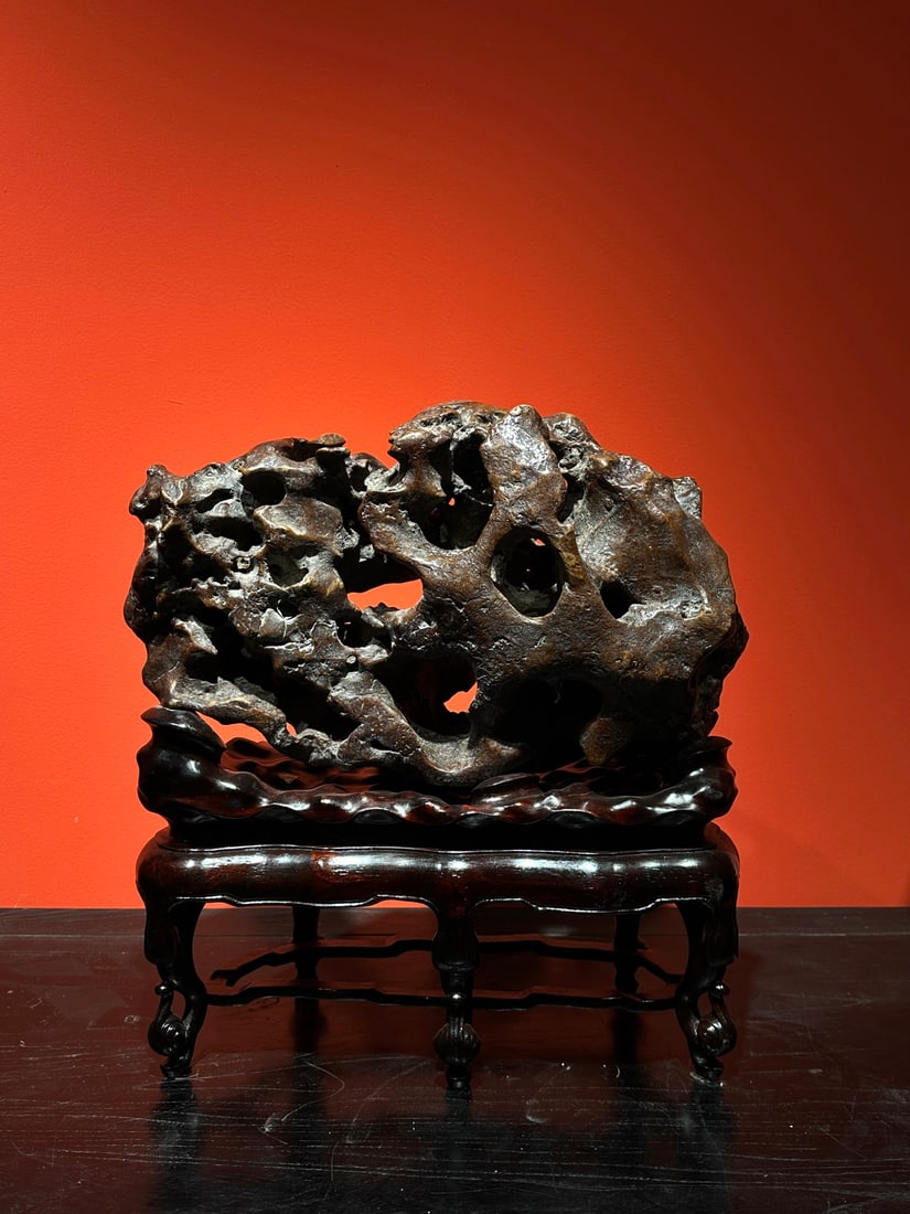 An Exquisite Taihu Stone Ornament: An Exquisite Taihu Stone Ornament Qing Dynasty, China Size:46cmx44cmx22cm (The Dimensions Of All Batches Are Manually Measured.If You Need More Detailed Information, Please Contact Our Customer Servic
