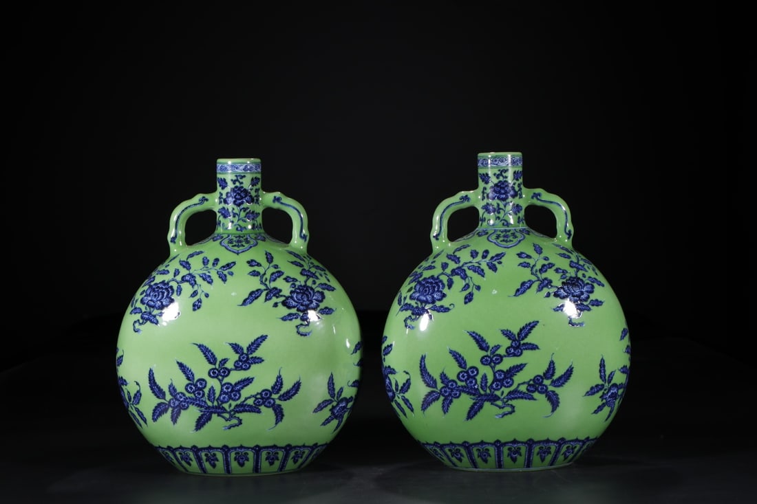 An Exquisite Blue and White Green Ground Flower Pattern Double-Ears Vase: An Exquisite Blue and White Green Ground Flower Pattern Double-Ears Vase Qing Dynasty, China Yongzheng Six-character Mark Size:36.6cm (The Dimensions Of All Batches Are Manually Measured.If You Need M