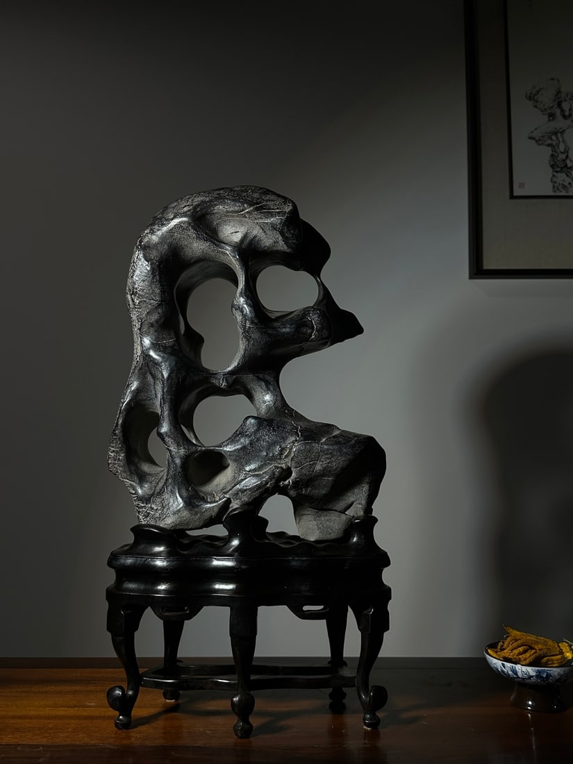 An Exquisite Taihu Stone Ornament: An Exquisite Taihu Stone Ornament Qing Dynasty, China Size:64cmx34cmx21cm (The Dimensions Of All Batches Are Manually Measured.If You Need More Detailed Information, Please Contact Our Customer Servic