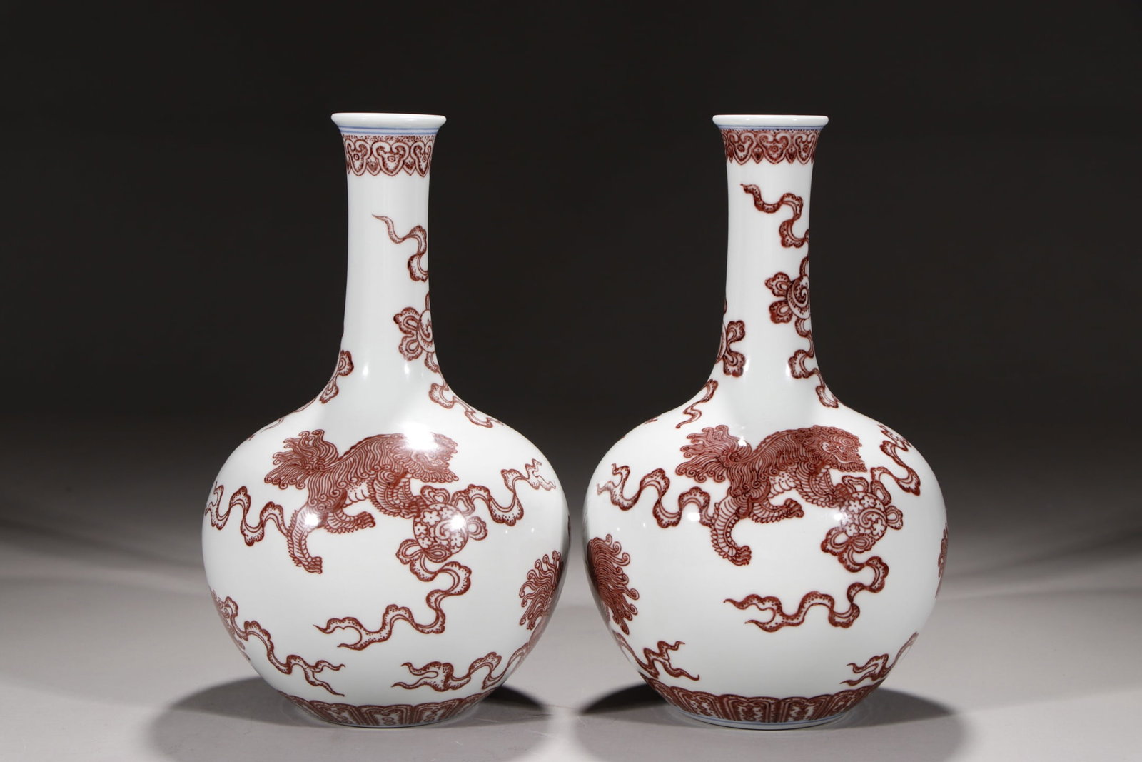 An Exquisite Underglaze-Red Lion Pattern Vase: An Exquisite Underglaze-Red Lion Pattern Vase Qing Dynasty, China Qianlong Six-character Mark Size:24.5cm (The Dimensions Of All Batches Are Manually Measured.If You Need More Detailed Information, Pl