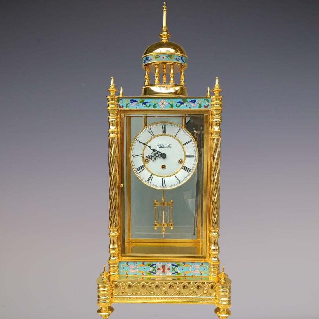 An Exquisite Gilt Bronze Lotus Pattern Clock: An Exquisite Gilt Bronze Lotus Pattern Clock Qing Dynasty, China Size:36cmx26cmx88cm (The Dimensions Of All Batches Are Manually Measured.If You Need More Detailed Information, Please Contact Our Cust