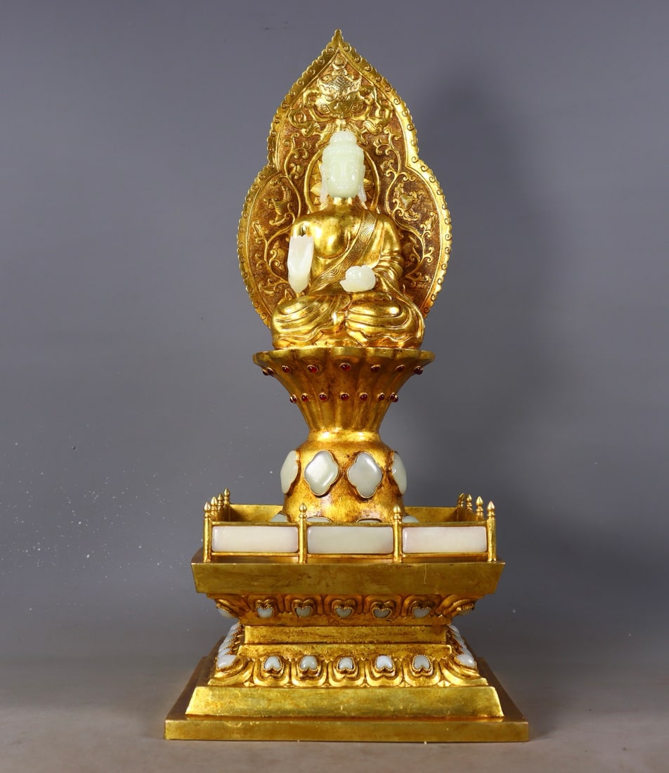 An Exquisite Gilt Bronze Inlaid White Jade Buddha Statue: An Exquisite Gilt Bronze Inlaid White Jade Buddha Statue Qing Dynasty, China Qianlong Four-character Mark Size:43.5cmx20cm Weight:2530g (The Dimensions Of All Batches Are Manually Measured.If You Need