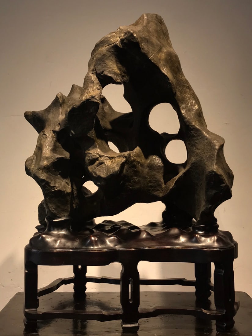 An Exquisite Taihu Stone Ornament: An Exquisite Taihu Stone Ornament Qing Dynasty, China Size:68cmx44cmx35cm (The Dimensions Of All Batches Are Manually Measured.If You Need More Detailed Information, Please Contact Our Customer Servic