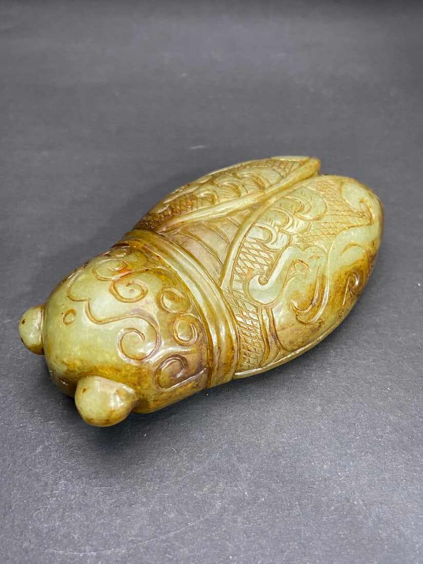 An Exquisite White Jade Cicada Pendant: An Exquisite White Jade Cicada Pendant Han Dynasty, China Size:9.7cmx5.7cmx2.65cm Weight:234g (The Dimensions Of All Batches Are Manually Measured.If You Need More Detailed Information, Please Contact