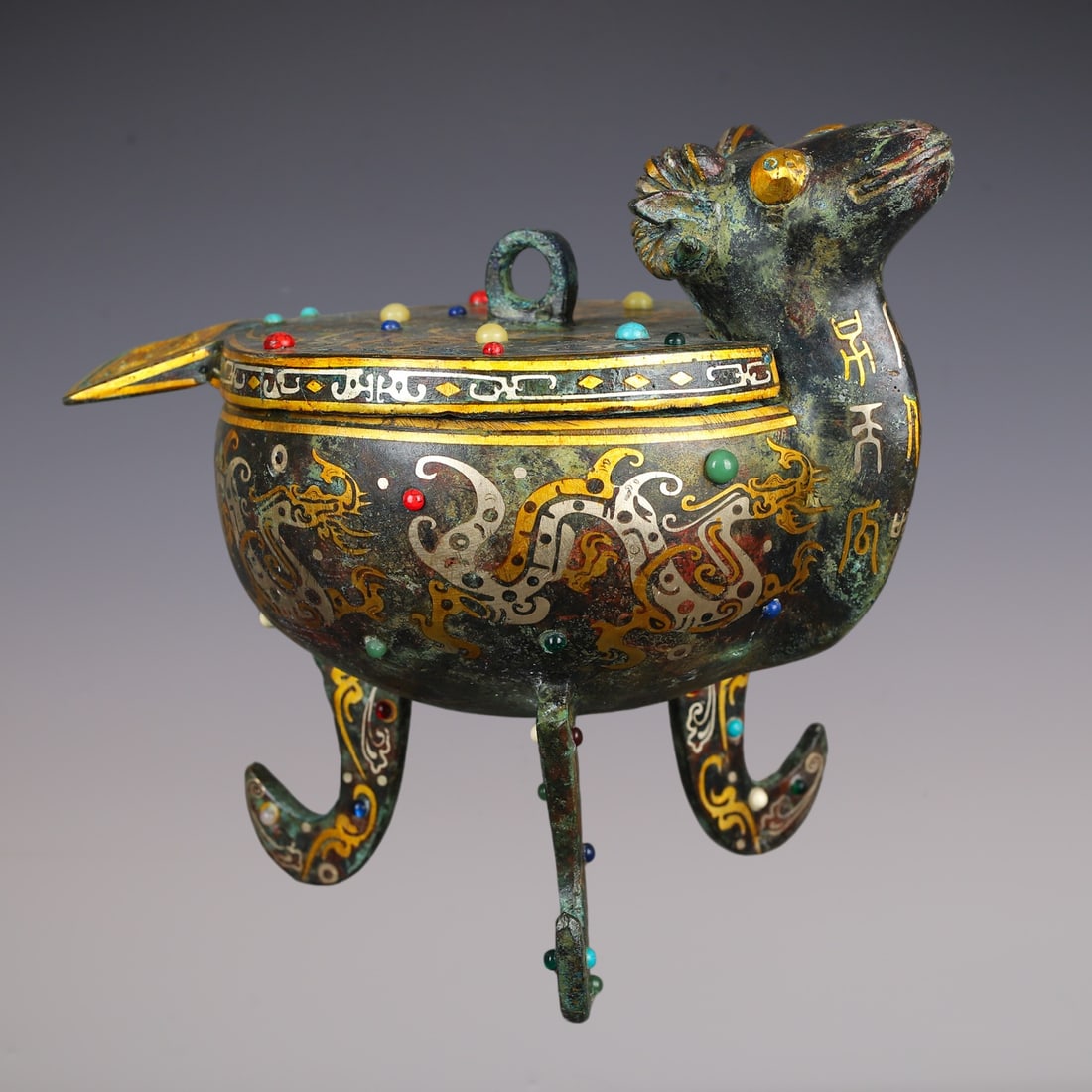 An Exquisite Bronze Inlaid Gold Dragon Pattern With Inscription Sheep-Shaped Censer: An Exquisite Bronze Inlaid Gold Dragon Pattern With Inscription Sheep-Shaped Censer Han Dynasty, China Size:26cmx18cmx21cm Weight:3000g (The Dimensions Of All Batches Are Manually Measured.If You Need