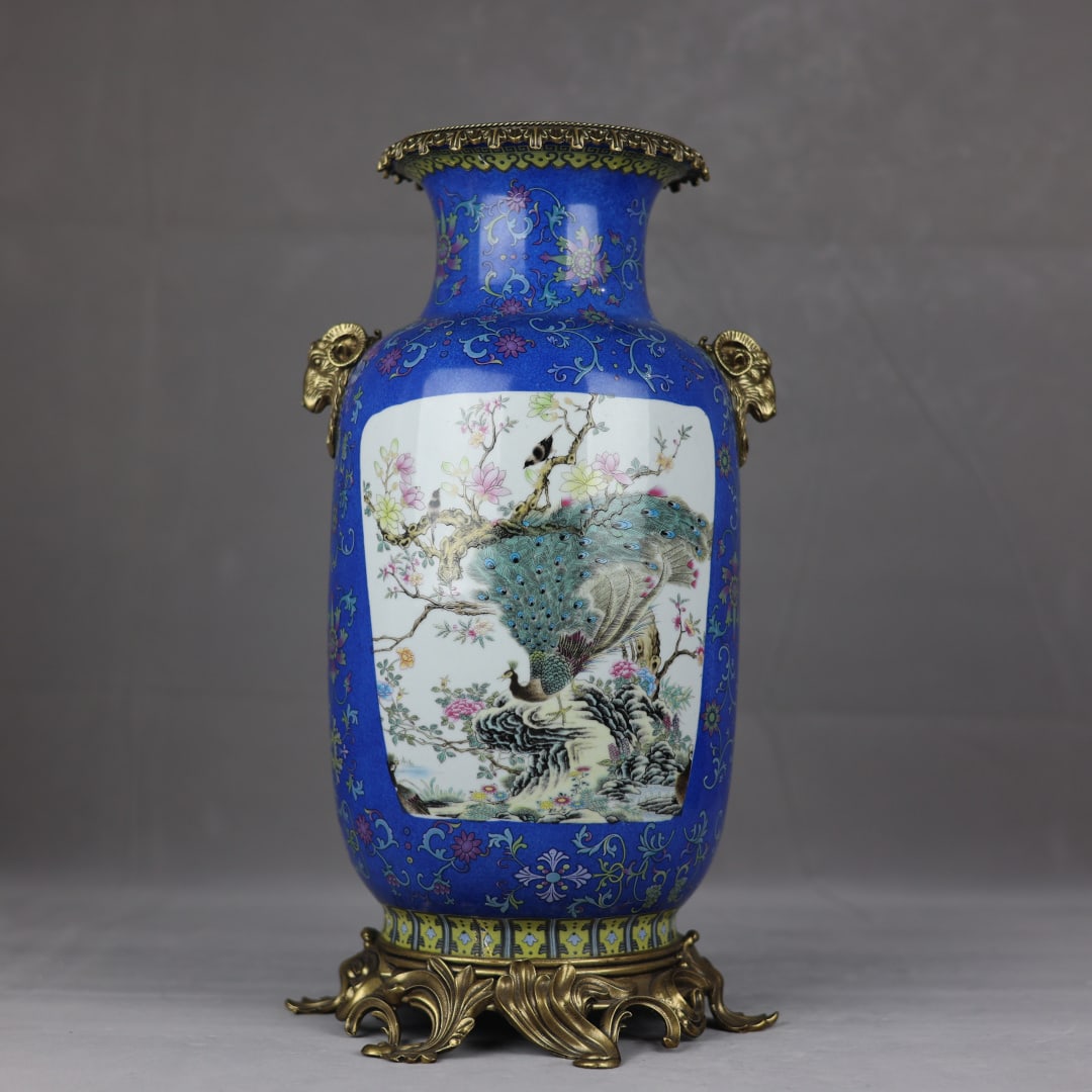 An Exquisite Enamel Inlaid Bronze Lotus Pattern Flower and Bird Pattern Double-Ears Vase: An Exquisite Enamel Inlaid Bronze Lotus Pattern Flower and Bird Pattern Double-Ears Vase Qing Dynasty, China Qianlong Four-character Mark Size:47cmx25cm (The Dimensions Of All Batches Are Manually Mea