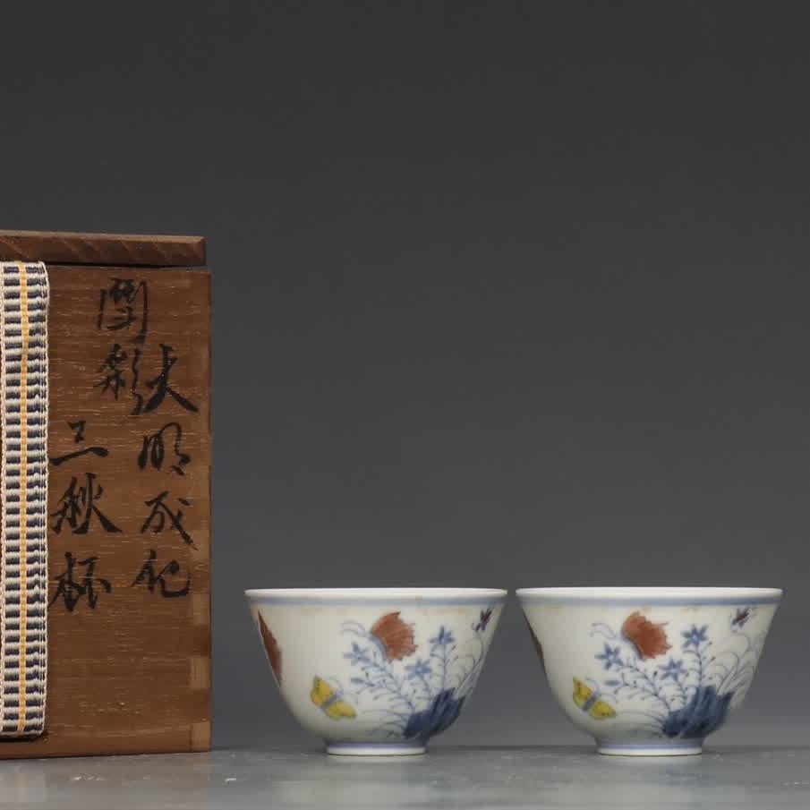 A pair of Ming Dynasty Chenghua Doucai Sanqiu Cup: A pair of Chenghua Doucai Sanqiu cups in the Ming Dynasty SIZE: H:4.3cm MouthD:7cm (The Dimensions Of All Batches Are Manually Measured.If You Need More Detailed Information, Please Contact Our Custom