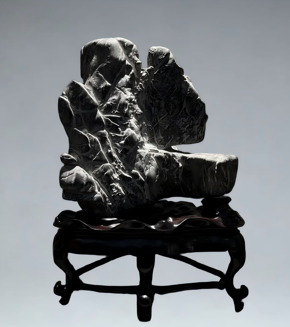 A Qing Dynasty Lingbi stone mountain-type study ornament: Qing Dynasty Lingbi stone mountain type study ornament SIZE: H:35cm W:25cm T:18cm (The Dimensions Of All Batches Are Manually Measured.If You Need More Detailed Information, Please Contact Our Custome