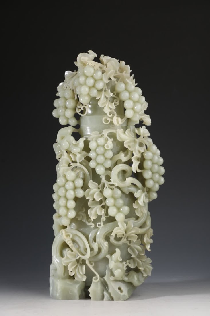 A Qing Dynasty Hetian carved grape jade vase (1 of 9)