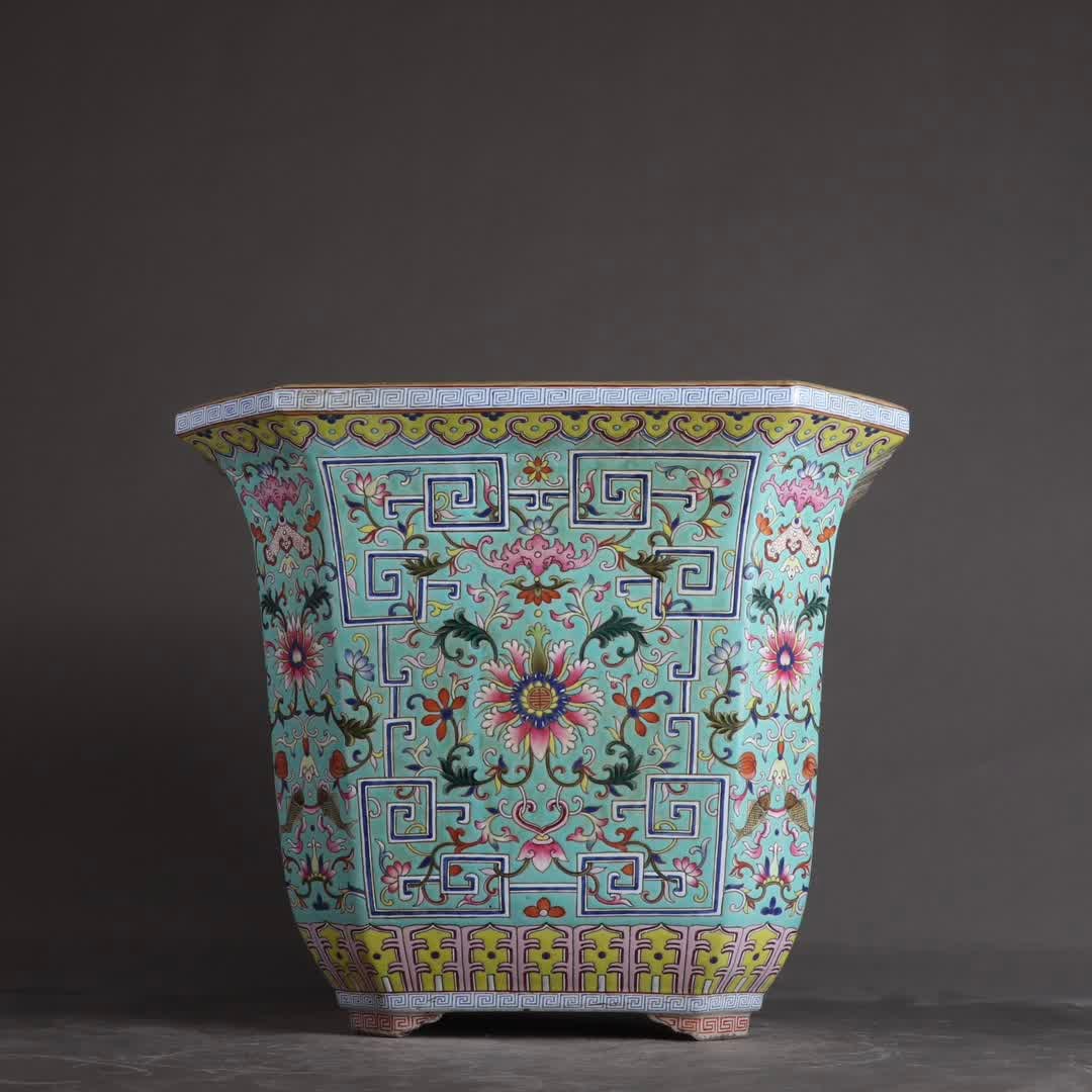 A Qing Dynasty Qianlong green pastel entwined flower auspicious with lingering patterns potted plant (1 of 9)