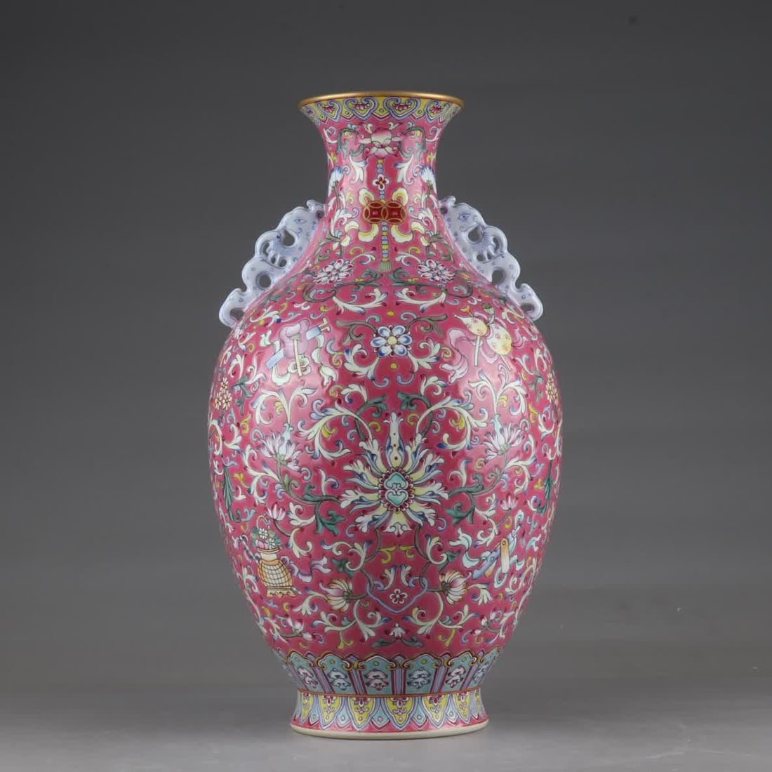 A Qing Dynasty Qianlong color rouge purple dark eight treasure double phoenix ear vase (1 of 9)
