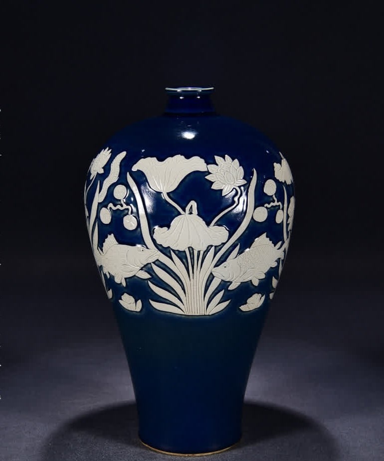 A Yuan Dynasty sacrificial blue white carved fish algae pattern plum bottle: Yuan Dynasty sacrificial blue white carved fish algae pattern plum bottle SIZE: H:44cm W:26cm (The Dimensions Of All Batches Are Manually Measured.If You Need More Detailed Information, Please Contact
