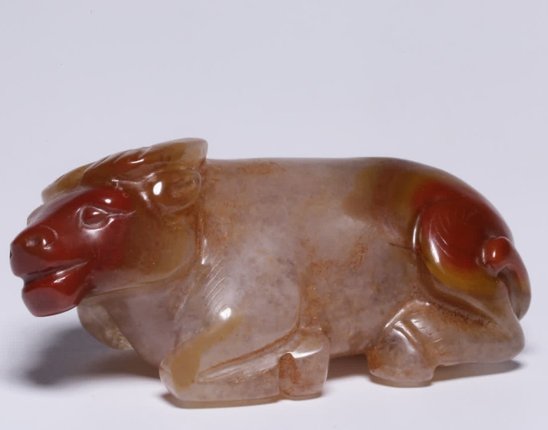 A Ming Dynasty red manuscript agate lying cow (1 of 9)