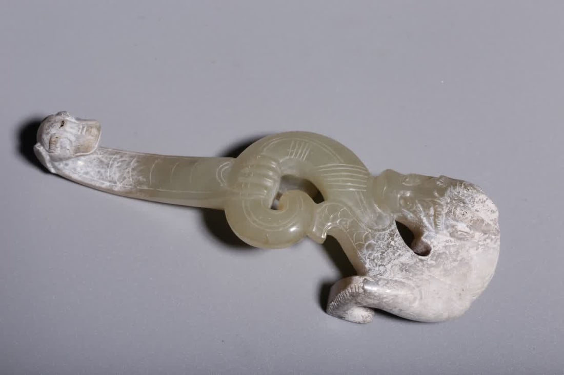 A piece of war Han Dynasty Hetian jade dragon with hooks (1 of 7)