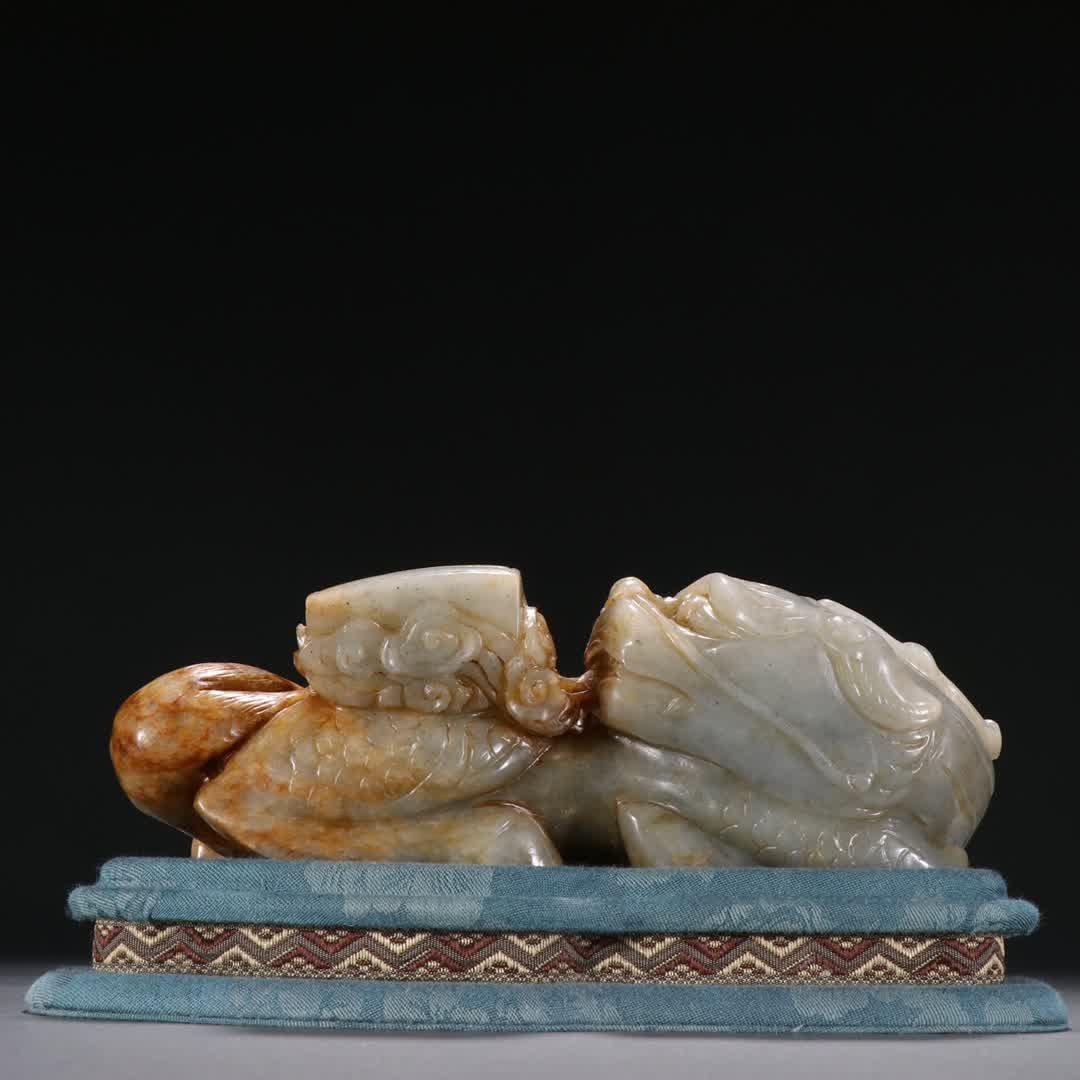 A Qing Dynasty Hetian jade seed material unicorn book ornament: Qing Dynasty Hetian jade seed material unicorn book ornament SIZE: H:6cm W:17.8cm W:1746g (The Dimensions Of All Batches Are Manually Measured.If You Need More Detailed Information, Please Contact Our