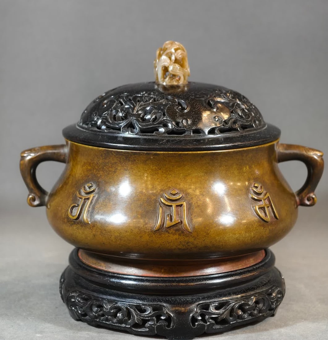 A Ming Dynasty ruyi ear copper smoker (1 of 11)