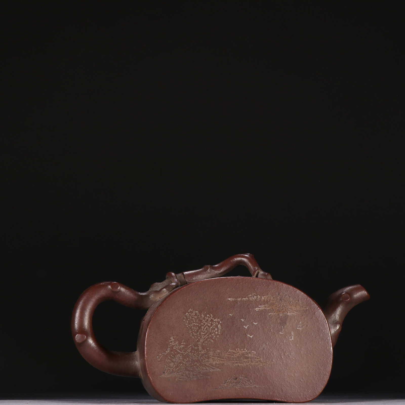 A Qing Dynasty purple sand landscape poetry teapot: Qing Dynasty purple sand landscape poetry teapot SIZE: H:8.3cm W:16.5cm (The Dimensions Of All Batches Are Manually Measured.If You Need More Detailed Information, Please Contact Our Customer Service 