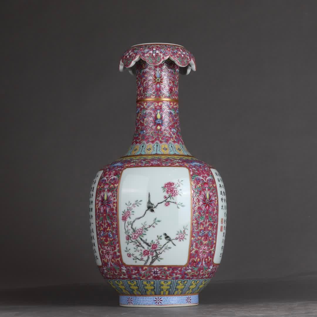 A Qing Dynasty Qianlong pastel gold-painted carmine-red background entwined lotus window flower bird: Qing Dynasty Qianlong pastel gold-painted carmine red background entwined lotus window flower bird poetry flower mouth vase SIZE: H: 33cm Belly diameter 18.5cm (The Dimensions Of All Batches Are Manua