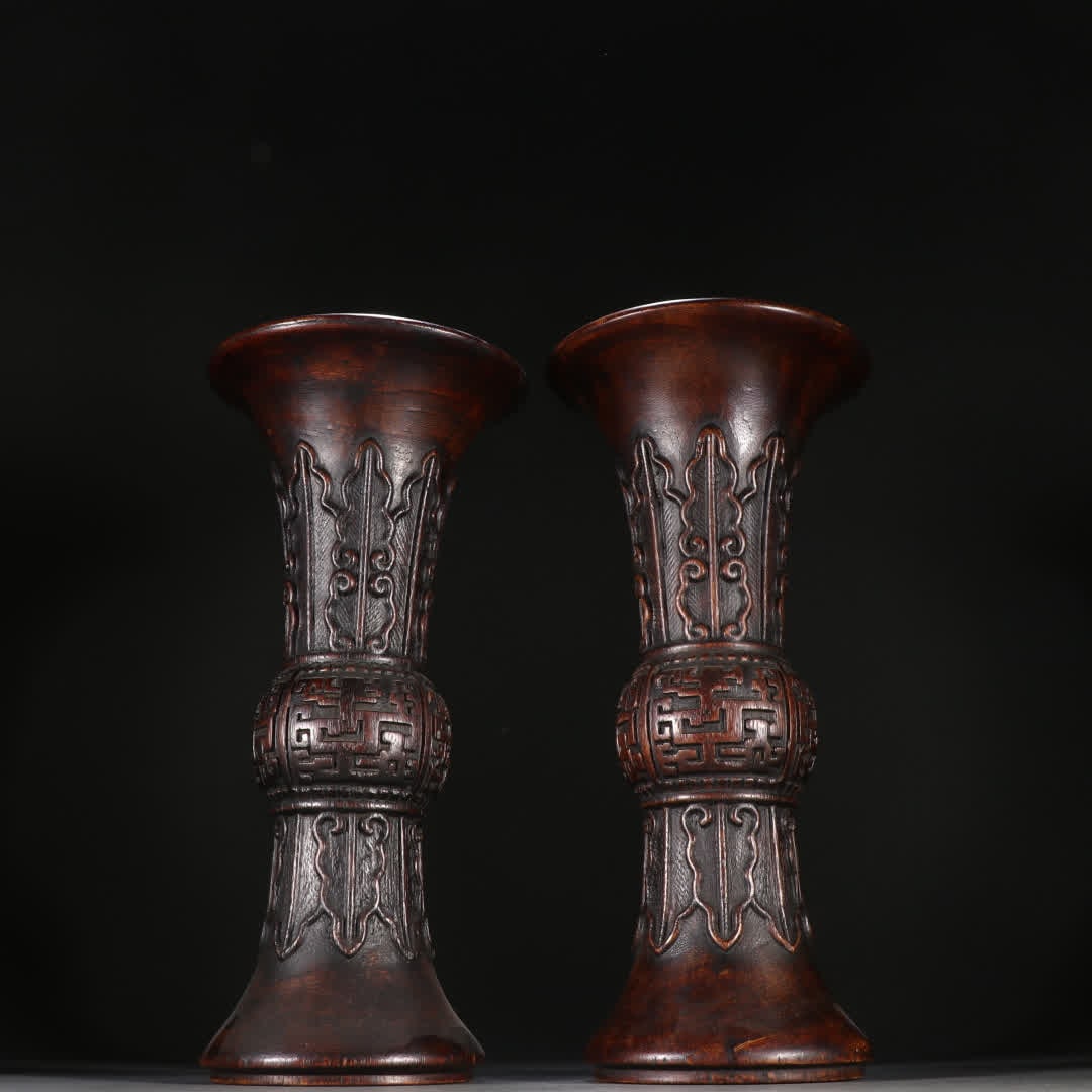 A pair of Qing Dynasty agarwood dragon pattern flower cups: A pair of agarwood dragon pattern flower cups in the Qing Dynasty SIZE: H: 28cm W: 13.2cm Single W: 387.7g (The Dimensions Of All Batches Are Manually Measured.If You Need More Detailed Information, P