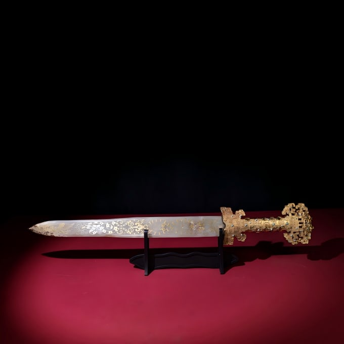 A Han Dynasty jade and copper inlaid jade cuo gold and silver sword (1 of 9)