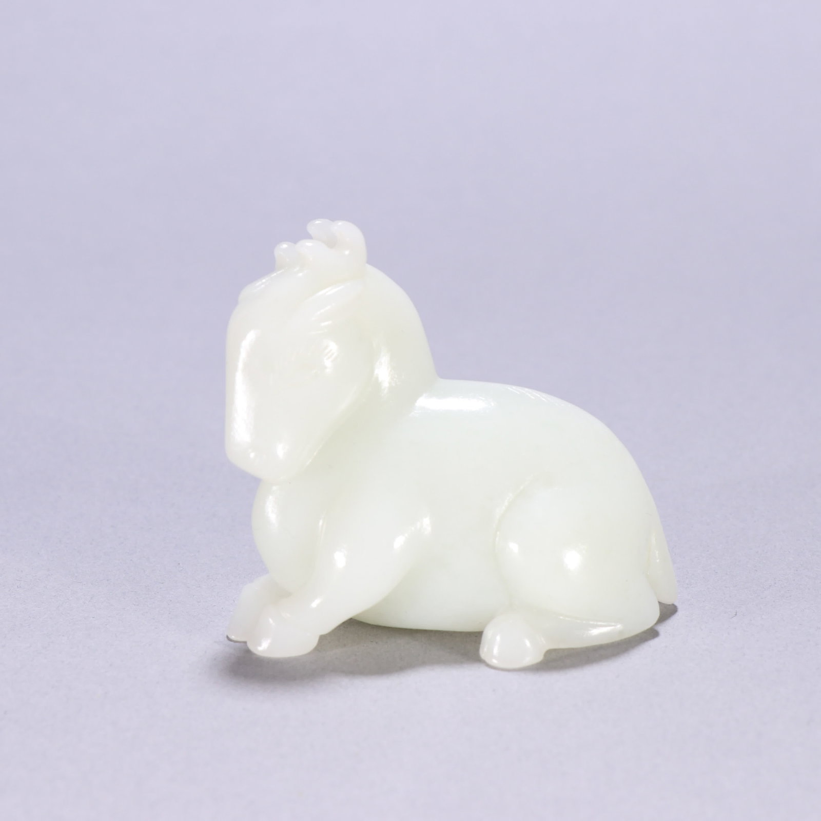 A Qing Dynasty Hetian jade horse ornament: Qing Dynasty Hetian jade horse ornament SIZE: H:5.2cm W:6.1cm W:115.7g (The Dimensions Of All Batches Are Manually Measured.If You Need More Detailed Information, Please Contact Our Customer Service B