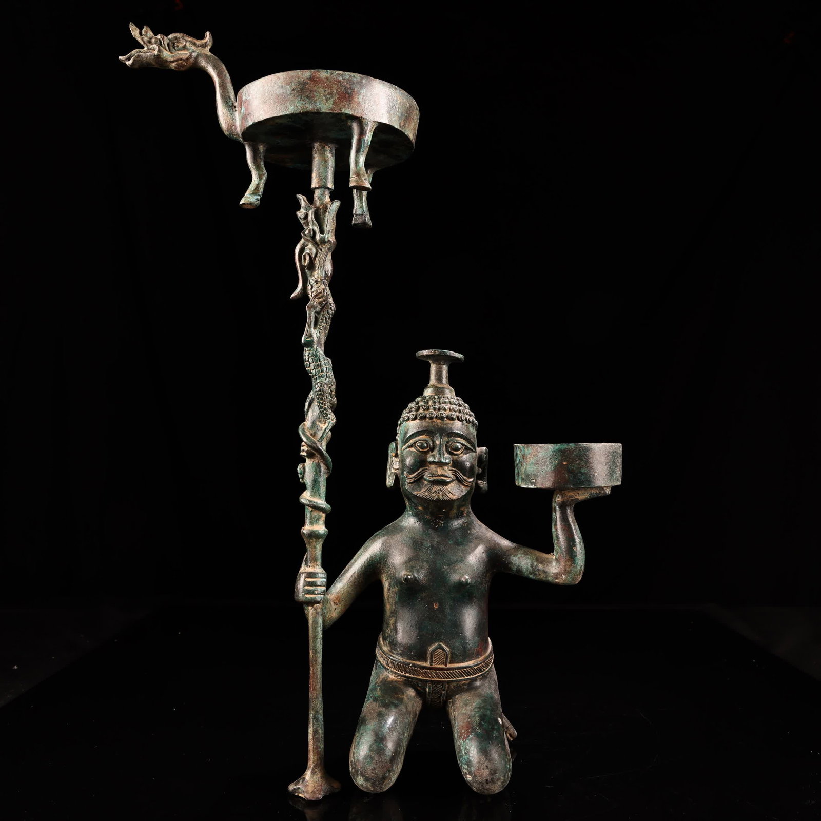 A bronze kneeling oil lamp: Bronze kneeling oil lamp SIZE: W:2500g H:42cm W:28cm (The Dimensions Of All Batches Are Manually Measured.If You Need More Detailed Information, Please Contact Our Customer Service Before Bidding.)