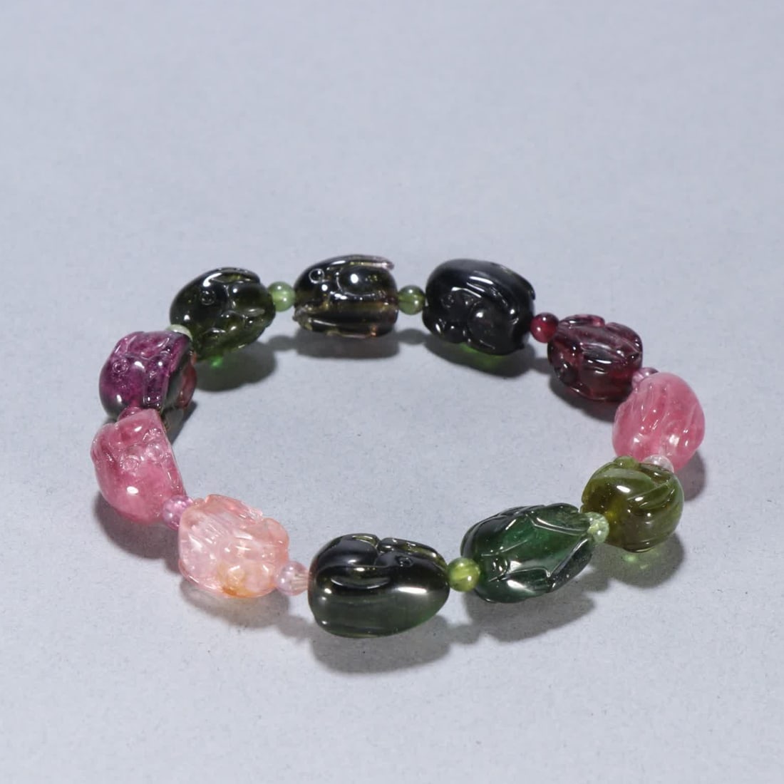 A Qing Dynasty tourmaline rabbit bracelet (1 of 9)