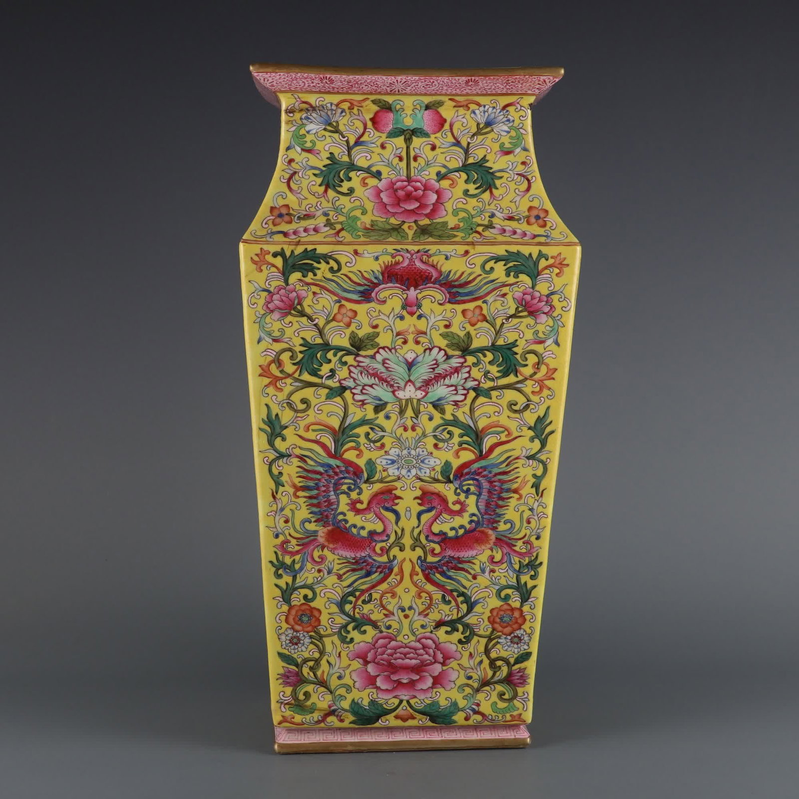 A square bottle with a yellow background pastel phoenix play peony pattern made in the Qianlong: Qing Dynasty Qianlong year yellow ground pastel phoenix play peony pattern square bottle SIZE: H:40.5cm MouthD:18cm (The Dimensions Of All Batches Are Manually Measured.If You Need More Detailed Infor