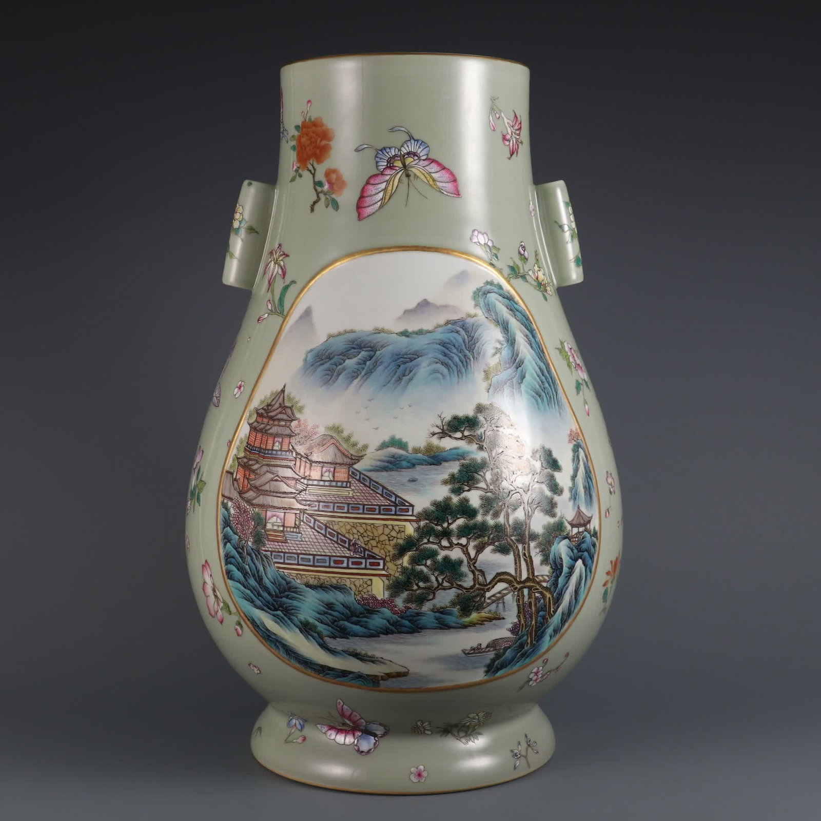 A Qing Dynasty Qianlong year bean celadon with pastel consecrated landscape pavilion ear vase (1 of 11)