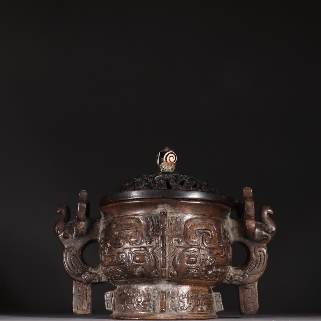 A Qing Dynasty agarwood gluttonous amphora aroma burner: Qing Dynasty agarwood gluttonous pattern amphora aroma burner SIZE: H:17.5cm W:21.2cm W:405.8g (The Dimensions Of All Batches Are Manually Measured.If You Need More Detailed Information, Please Contac