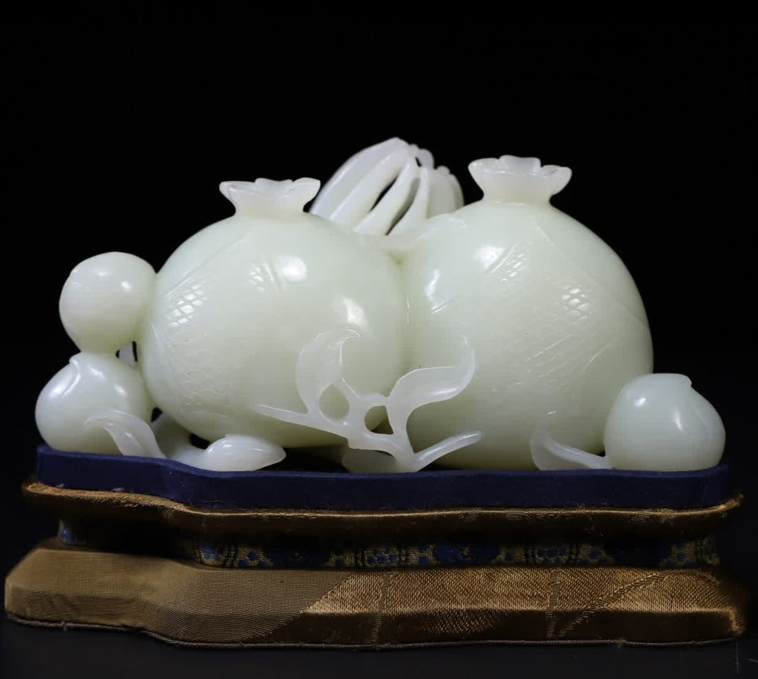 A Qing Dynasty Hetian jade Fu Lu Shou three more pomegranate ornaments: Qing Dynasty Hetian jade Fulu Shou three pomegranate ornaments SIZE: L:14.5cm W:6.4cm H:6.7cm W:648.7g (The Dimensions Of All Batches Are Manually Measured.If You Need More Detailed Information, Pleas