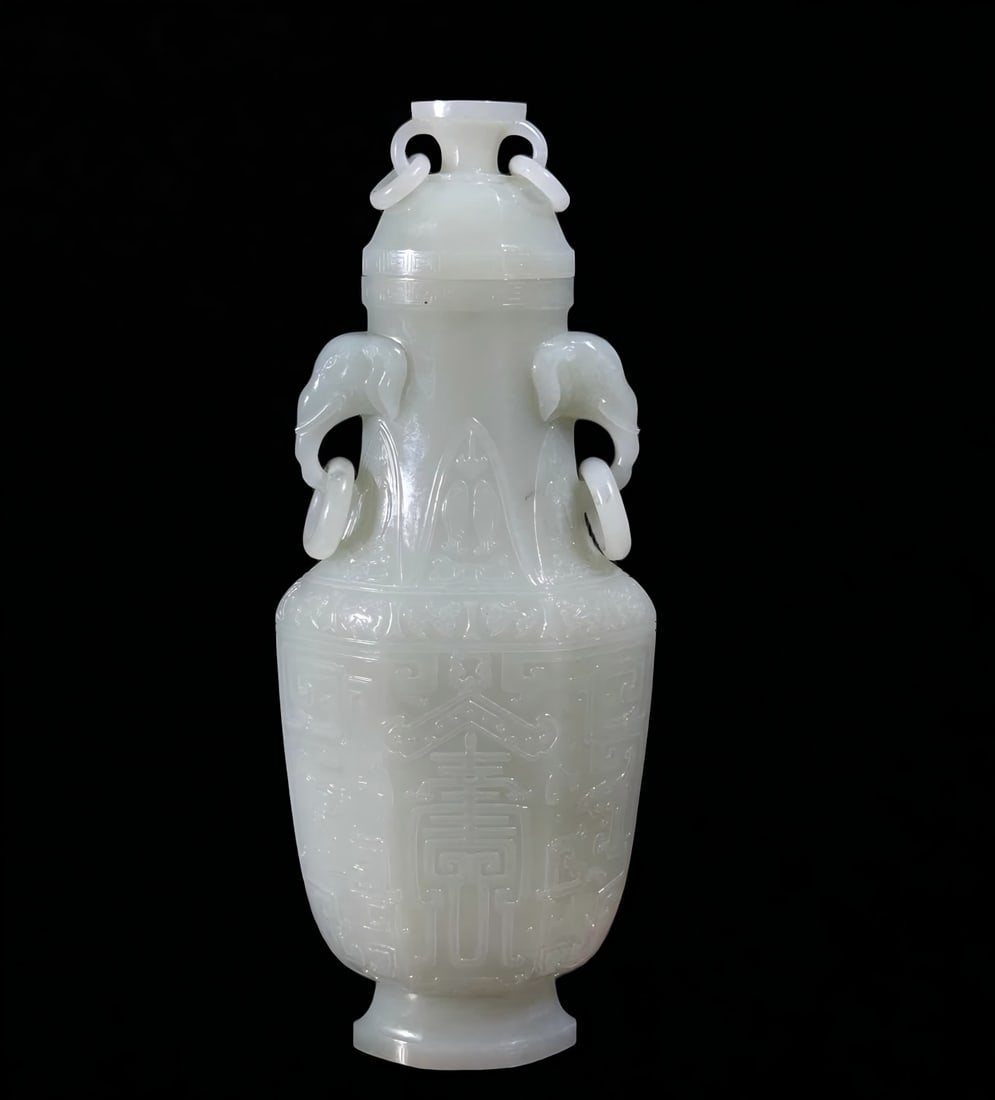 A six-square bottle of Qing Dynasty white jade elephant ear longevity pattern living ring bottle (1 of 7)