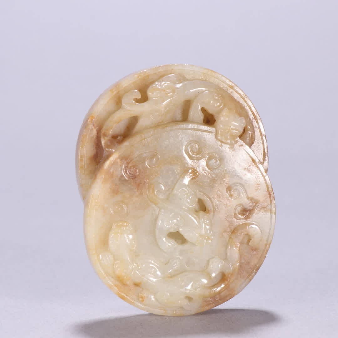 A Qing Dynasty Hetian jade dragon pattern double piece (1 of 9)