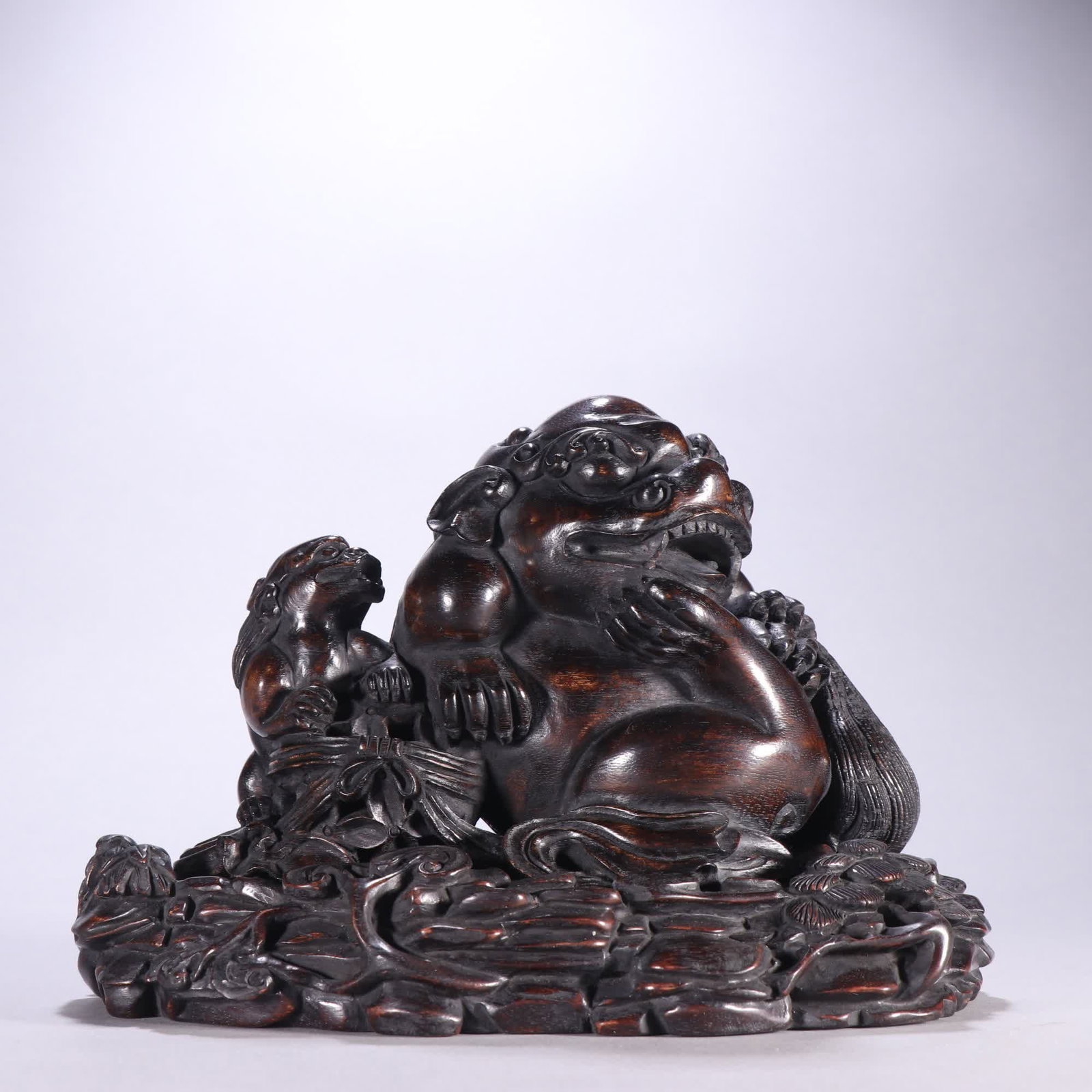 A Qing Dynasty agarwood lioness ornament: Qing Dynasty agarwood lioness ornament SIZE: Total H: 15cm W: 20cm Net W: 192g (The Dimensions Of All Batches Are Manually Measured.If You Need More Detailed Information, Please Contact Our Customer S