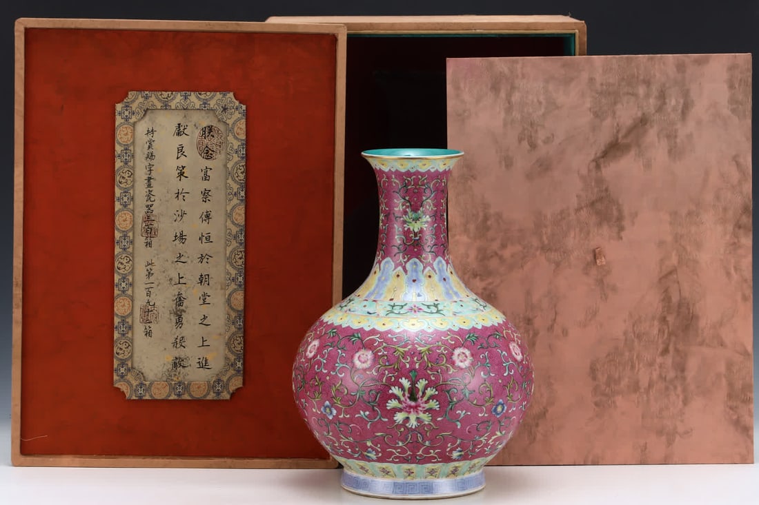 A Qing Qianlong enamel carmine red entwined lotus pattern appreciation bottle: Qing Qianlong enamel carmine red entwined lotus pattern appreciation vase SIZE: H: 38.2cm Abdominal diameter 27.8cm (The Dimensions Of All Batches Are Manually Measured.If You Need More Detailed Infor