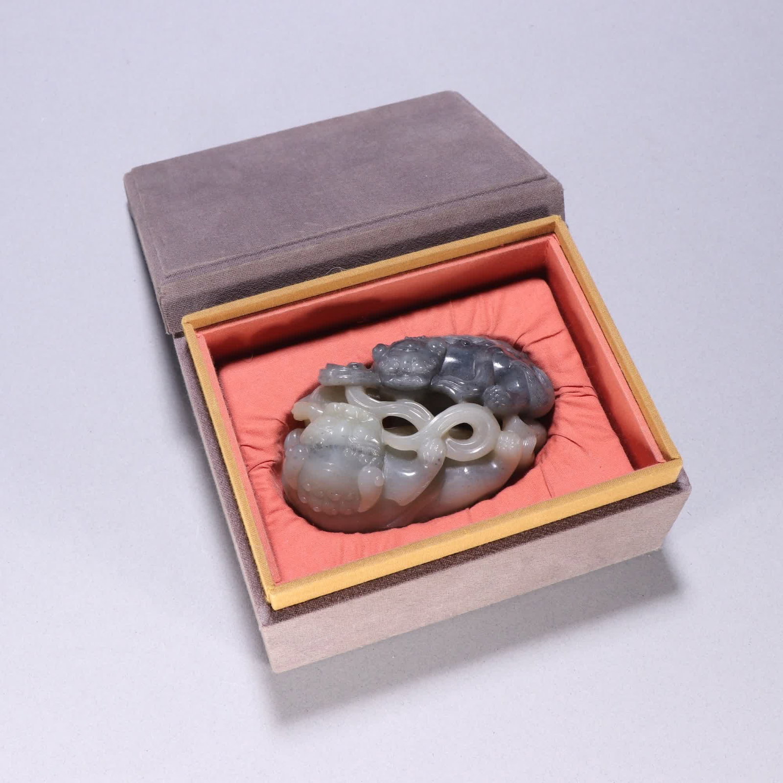 A Qing Dynasty Hetian blue and white seed material double lion ball ornament (1 of 9)
