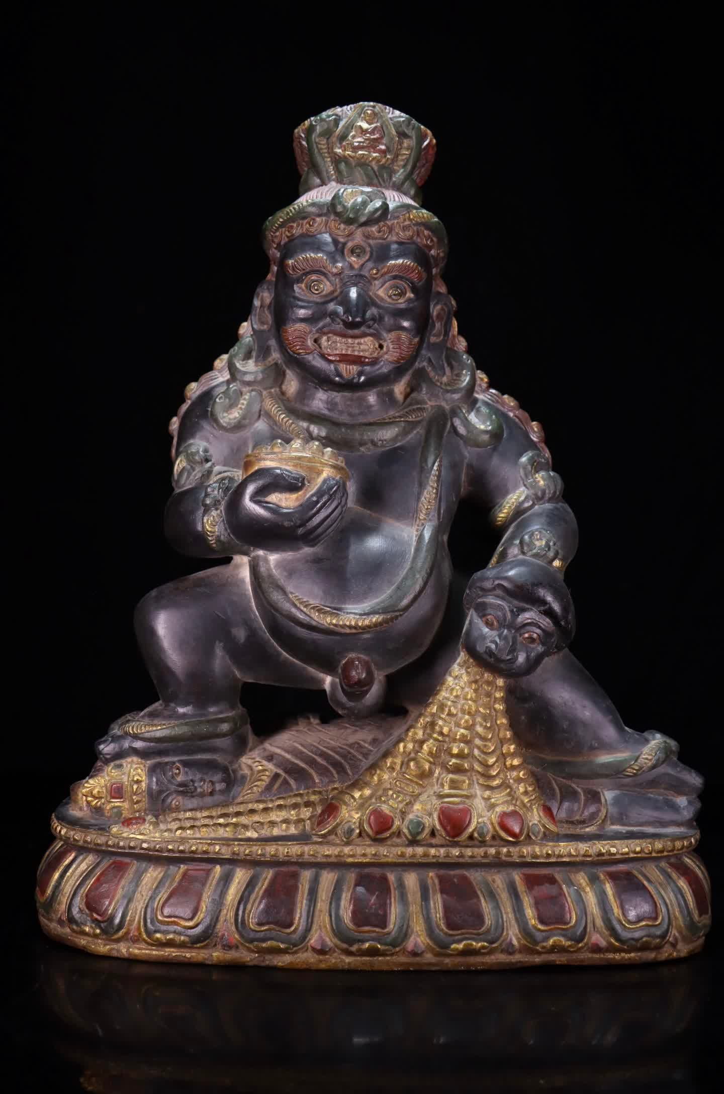 A Qing Dynasty black stone engraved painted gilt black God of Wealth: Qing Dynasty black stone carved painted gilt black god of wealth SIZE: 40x32x11cm (The Dimensions Of All Batches Are Manually Measured.If You Need More Detailed Information, Please Contact Our Custome