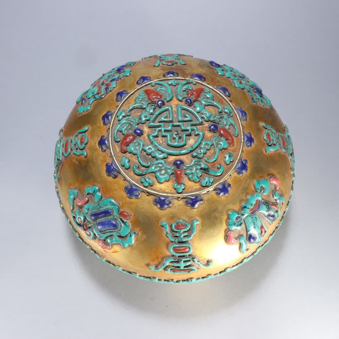 A Qing Dynasty copper-gilt inlaid turquoise eight-treasure pattern lid box: Qing Dynasty copper gilt inlaid turquoise eight-treasure pattern lid box SIZE: H:12.6cm W:21.5cm W:2440.2g (The Dimensions Of All Batches Are Manually Measured.If You Need More Detailed Information, P