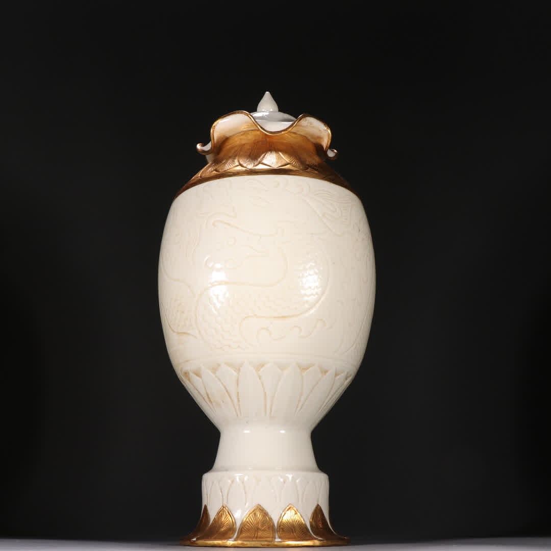 A Song Ding kiln wrapped golden dragon pattern jar (1 of 9)