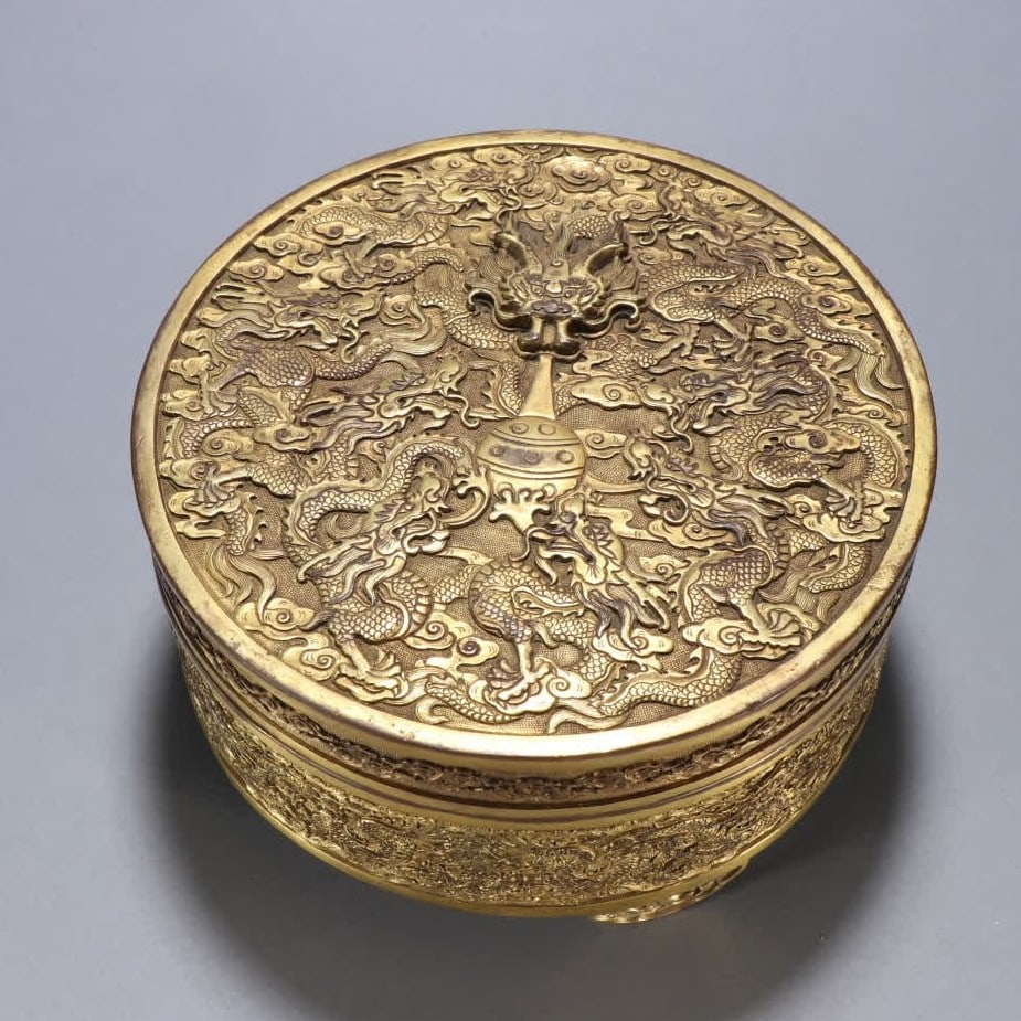 A Qing Dynasty copper gilt dragon play bead pattern lid box: Qing Dynasty copper gilt dragon play bead pattern lid box SIZE: H:9.2cm W:17.5cm W:2380g (The Dimensions Of All Batches Are Manually Measured.If You Need More Detailed Information, Please Contact Our 