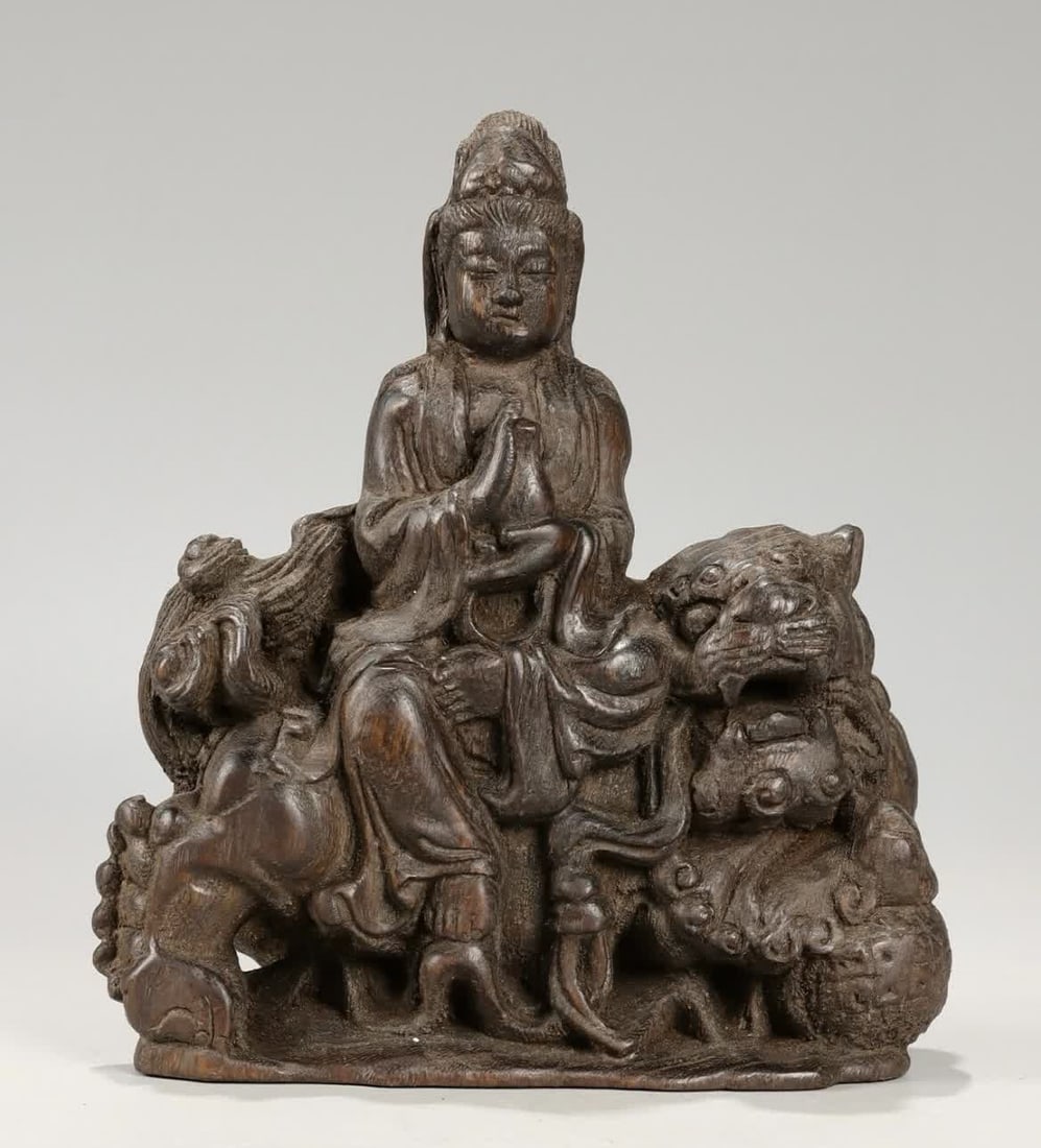 A Qing Dynasty Qinan agarwood carving Manjushri Bodhisattva ornament: Qing Dynasty Qinan agarwood carving Manjushri Bodhisattva ornament SIZE: L:13.5cm W:6cm H:16.5cm W:166.0g (The Dimensions Of All Batches Are Manually Measured.If You Need More Detailed Information, Pl