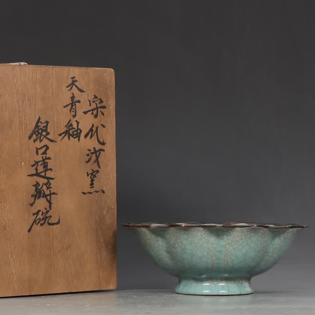 A Song Ru kiln azure glaze silver mouth Jingyang Palace lotus petal pattern bowl: Song Ru kiln sky blue glaze silver mouth Jingyang Palace lotus petal pattern bowl SIZE: H:7cm MouthD:19cm (The Dimensions Of All Batches Are Manually Measured.If You Need More Detailed Information, Pl