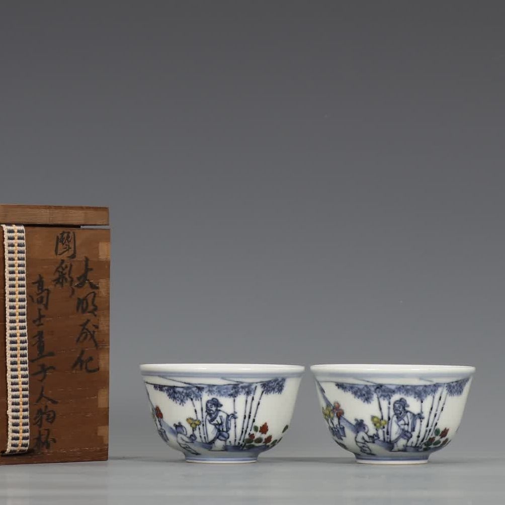 A pair of Ming Dynasty Chenghua Doucai Gaoshi Boy Character Cups (1 of 9)